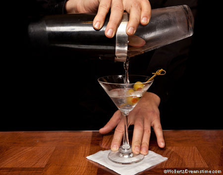 Bartender pouring martini