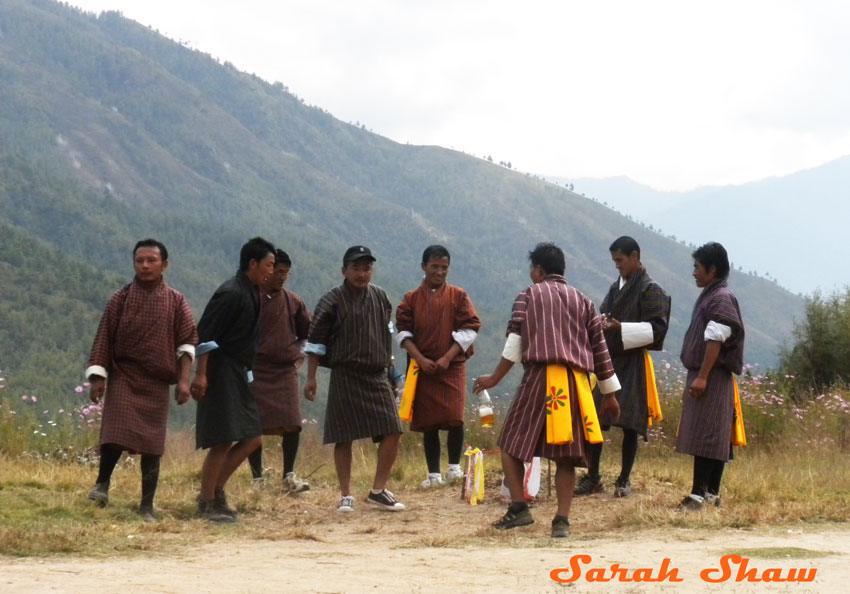 Bhutanese Men in Gho at an archery competition
