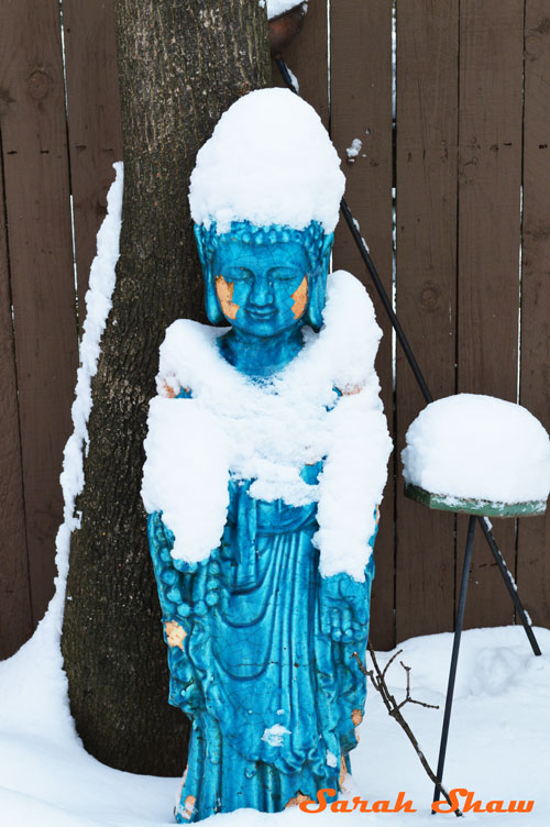 Turquoise Buddha garden statue