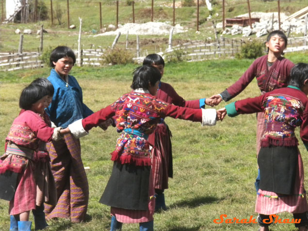 Brokpa girls with traditional colorful jackets