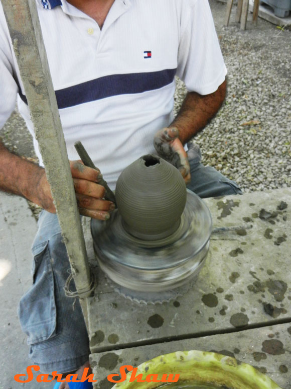 Collapsing the top to create a jar shape in Guatil, Costa Rica