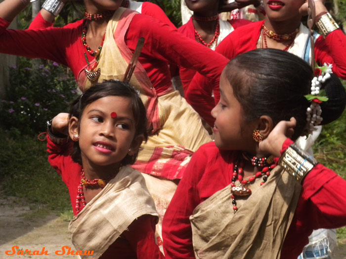 Girl dancers perform in a village in Assam, India