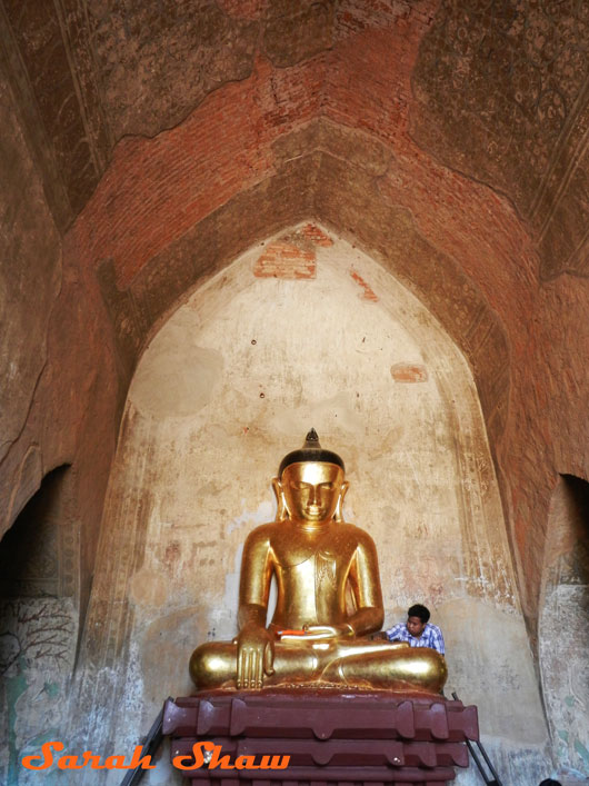 Gold leaf offering in a temple in Bagan, Myanmar