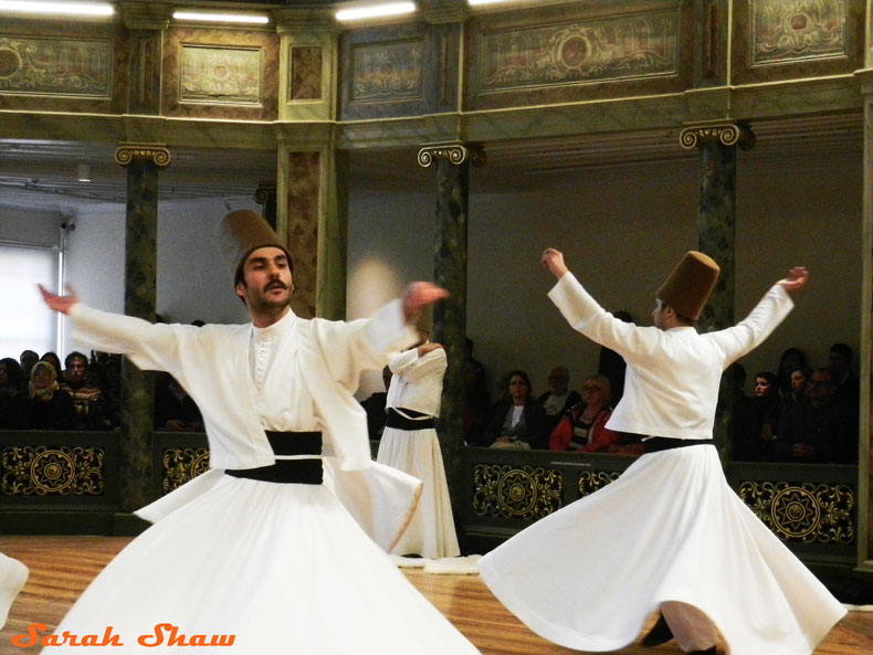 Whirling Devishes during a Sema Ceremony in Istanbul, Turkey