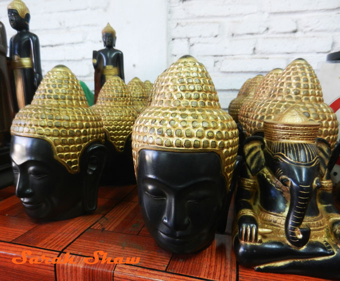 Head of the Buddha and Ganesh in a studio at Artisans Angkor