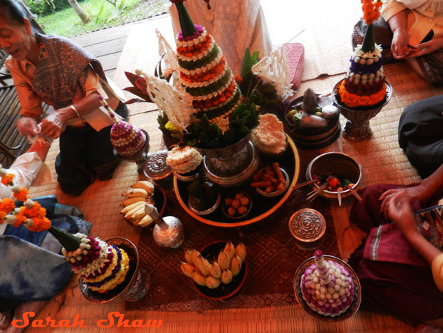 Pha khuan, or the pyramid shaped flower arrangement, in a baci ceremony