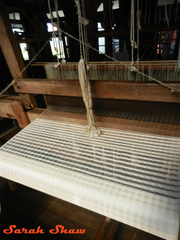 A loom weaving natural colored fiber at Khit Sunn Yin, Inle Lake, Myanmar