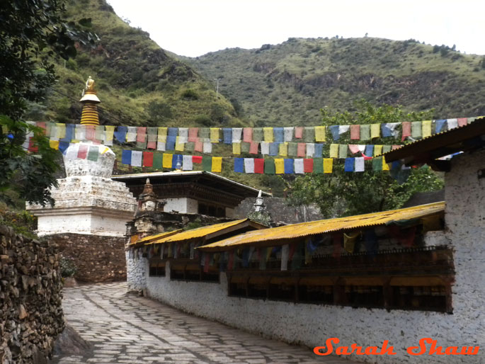 Prayer wheels and flags at Mongar Dzong