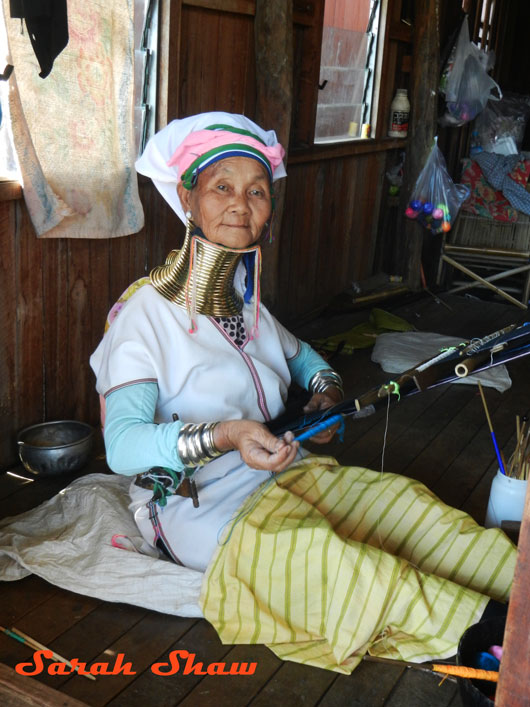 Padaung woman back strap loom Inle Lake Myanmar