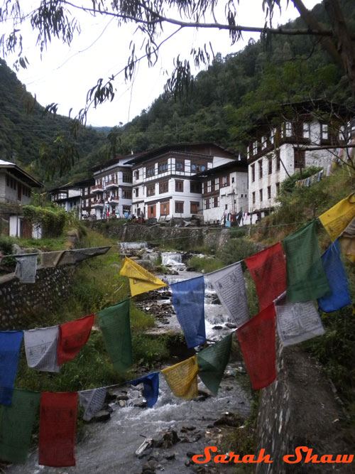 Prayer flags over a river in Trashigang