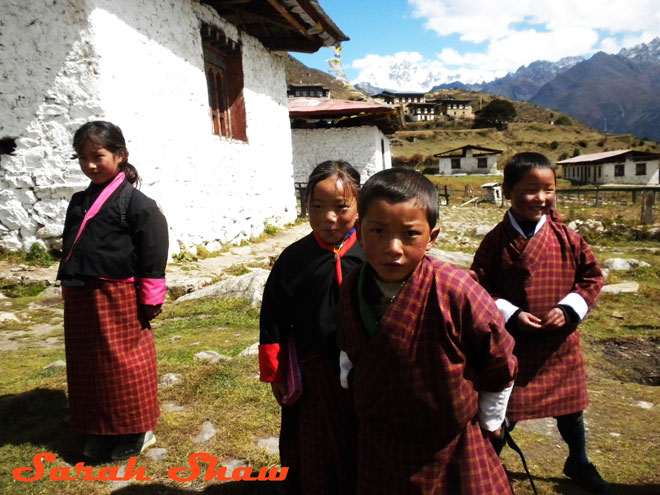 Children at school wearing the national dress of Bhutan