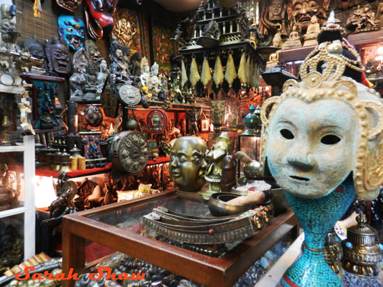 Treasures from Tibet are offered in the stall at the Chatuchak Weekend Market in Bangkok, Thailand