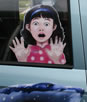 cartoon kid in car