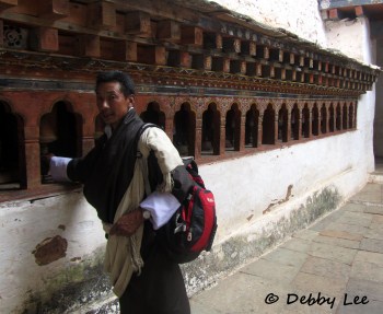 Bhutanese Prayer Wheels Man Turning