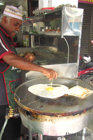 Cooking rotee canai in Penang