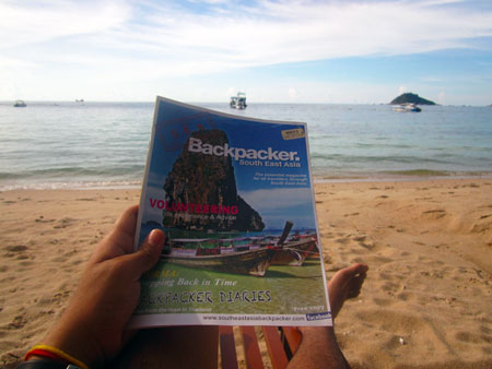 SEA Backpacker Magazine on the beach