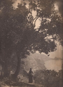 A women walking along the coast of Italy