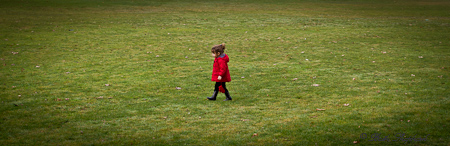 At Seward Park in a red coat
