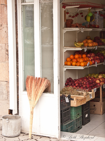 Broom and fruit stand in Gyumri