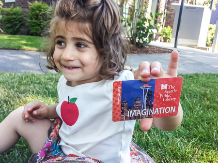 Newest Seattle Library member with her library card