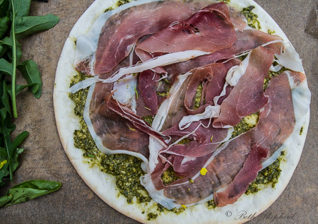 Pesto and speck on pizza