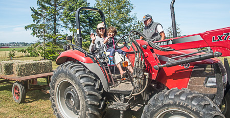 Tractor Mom and daughter