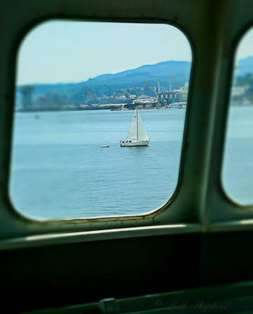 Sailboat through the ferry window
