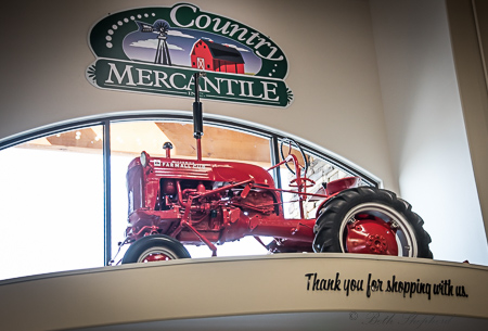 Country Mercantile red tractor in Richland