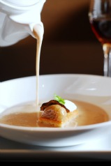 Cream poured into soup at Copperleaf Restaurant