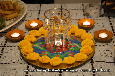 Light Diyas Flowers and Rangoli for Diwali