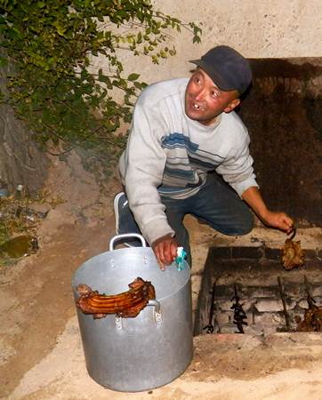 Local cooking Shaslik in a pit