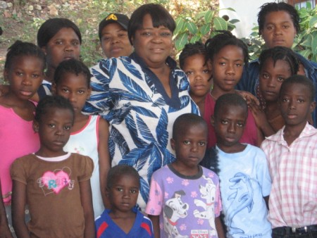 Sarah with Group of Haitian Children