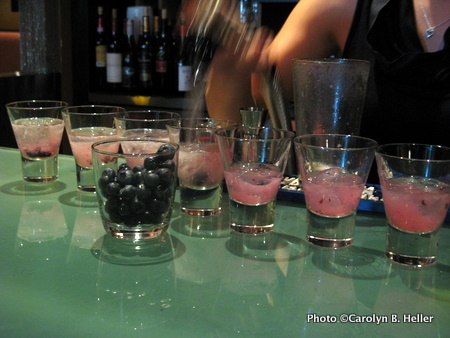 Mixing blueberry cocktails at Restaurant 62