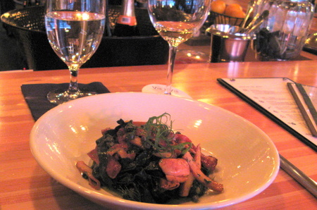 Grilled octopus with squid ink fettucine