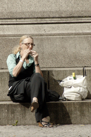 Woman Eating Alone