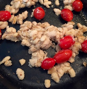 Blistered tomatoes and white beans