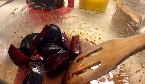 Cooked steel-cut oatmeal with plums