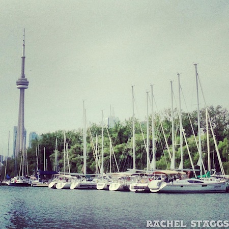 view of cn tower from toronto islands yacht club