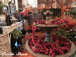Fountain loaded with berry garlands