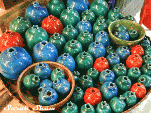 Bowl of pottery pomegranates