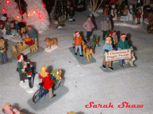 Miniatures make a holiday dog parade