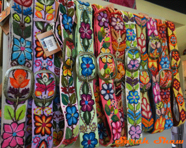 Woven colorful belts for sale in Tamarindo