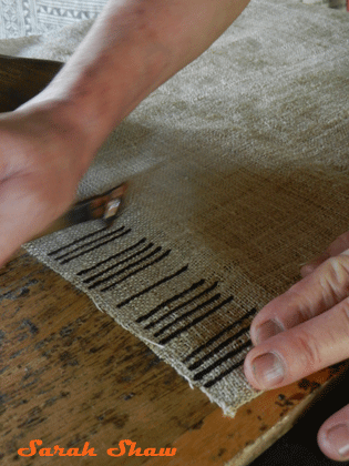 Laying out the grid for a Hmong batik design