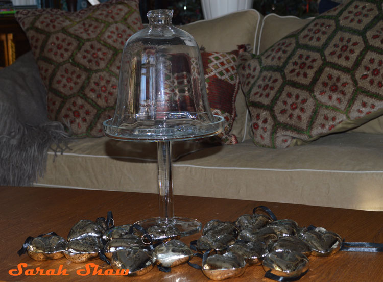 Glass cloche with stand and silver hearts