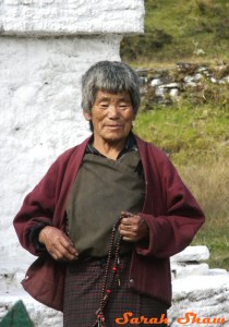 Praying around the chorten in Bhutan