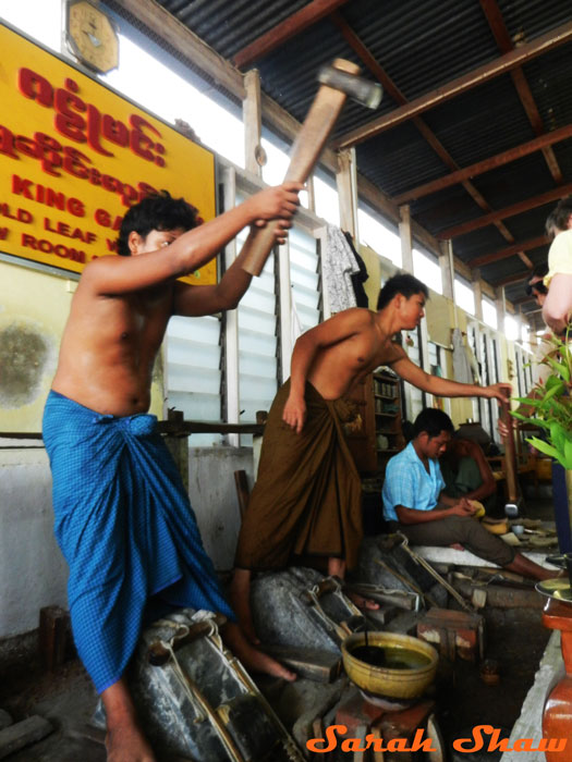 Hammering gold into leaf in Mandalay, Myanmar