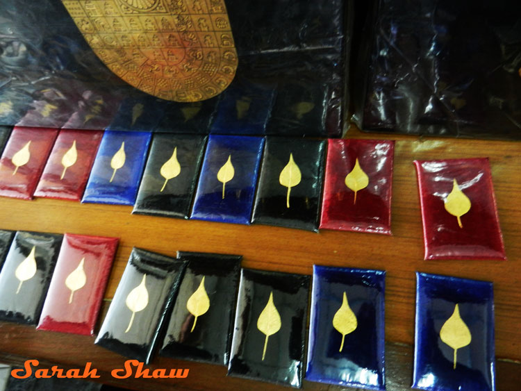 Gold Banyan leaves coated in gold leaf for sale in Mandalay, Myanmar