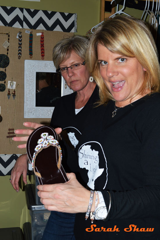 Shining A Light founder, Jennifer VanderGalien, and sister Tiffany Kennon, with the Tanzanian Beaded Sandals