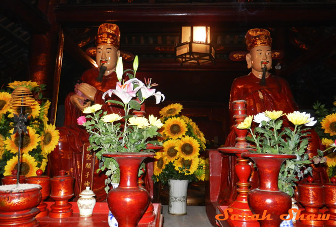 Flowers are offered at the Temple of Literature, Hanoi, Vietnam