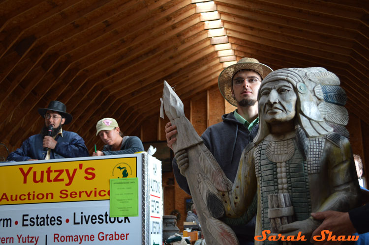 A cigar store indian at an Amish Farm Auction